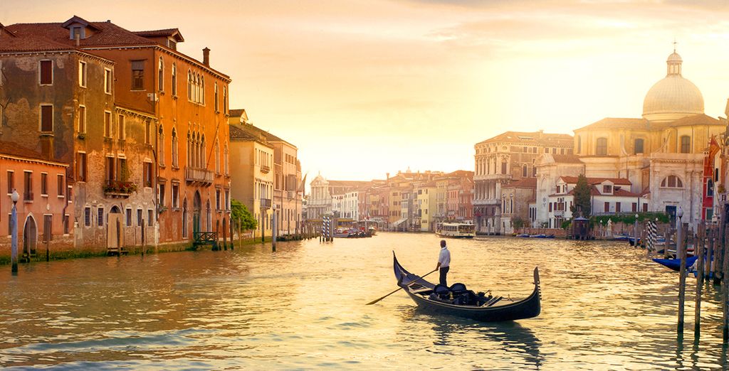 Experience a gondola ride in Venice