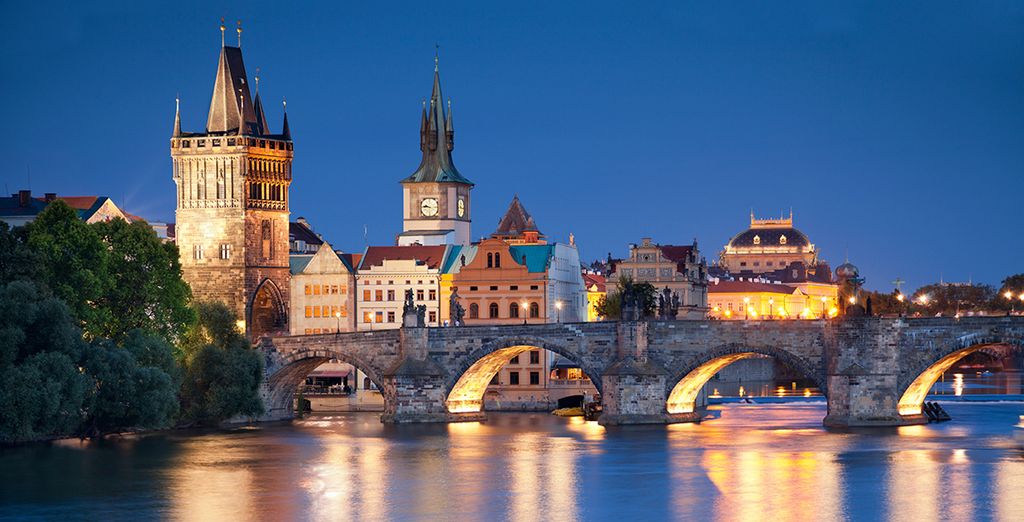 Visit the famous Charles Bridge in Prague, Czech Republic